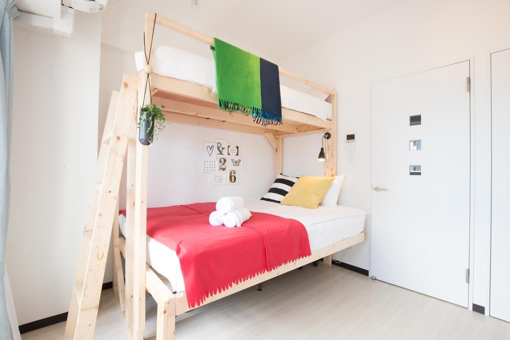 Uro Apartment Oszaka Szoba fotó